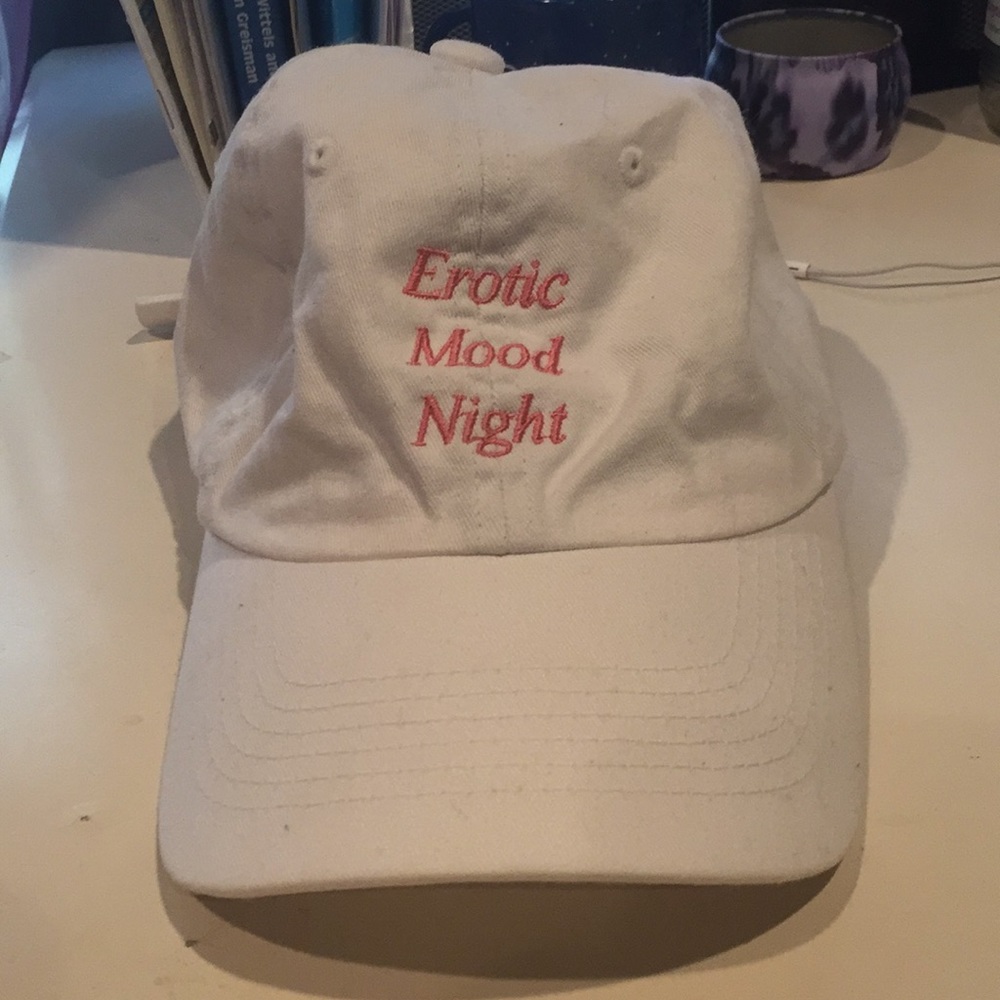 white cap with pink words